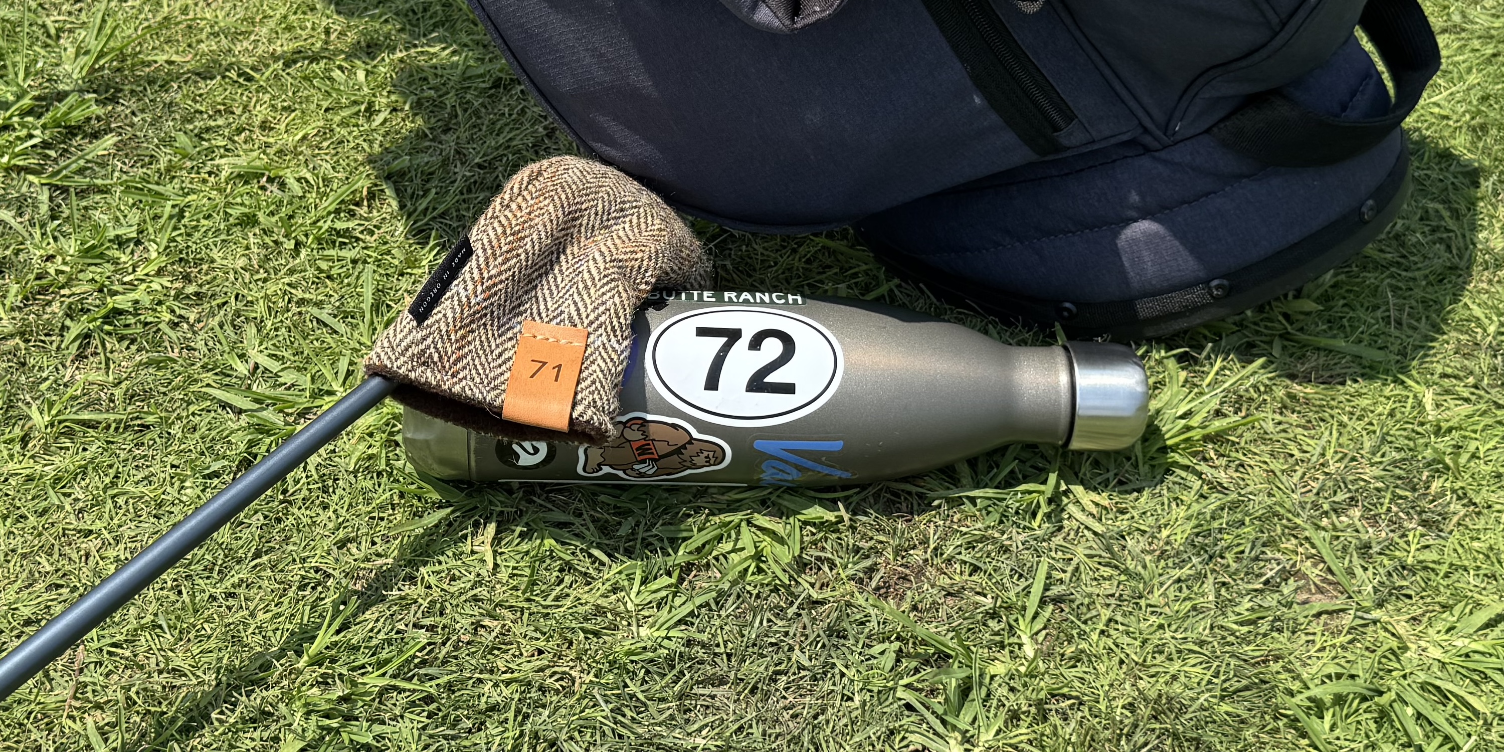 Red tee markers on a tee box